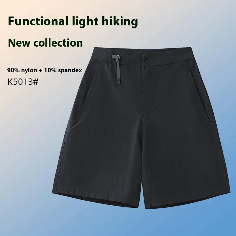 Men's khaki quick-drying sports shorts with 3D cut and elastic waistband laid flat.
