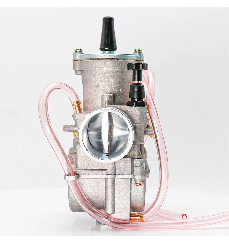 Seven PWK sandblasted motorcycle carburetors ranging from 21mm to 34mm sizes in colour box packaging