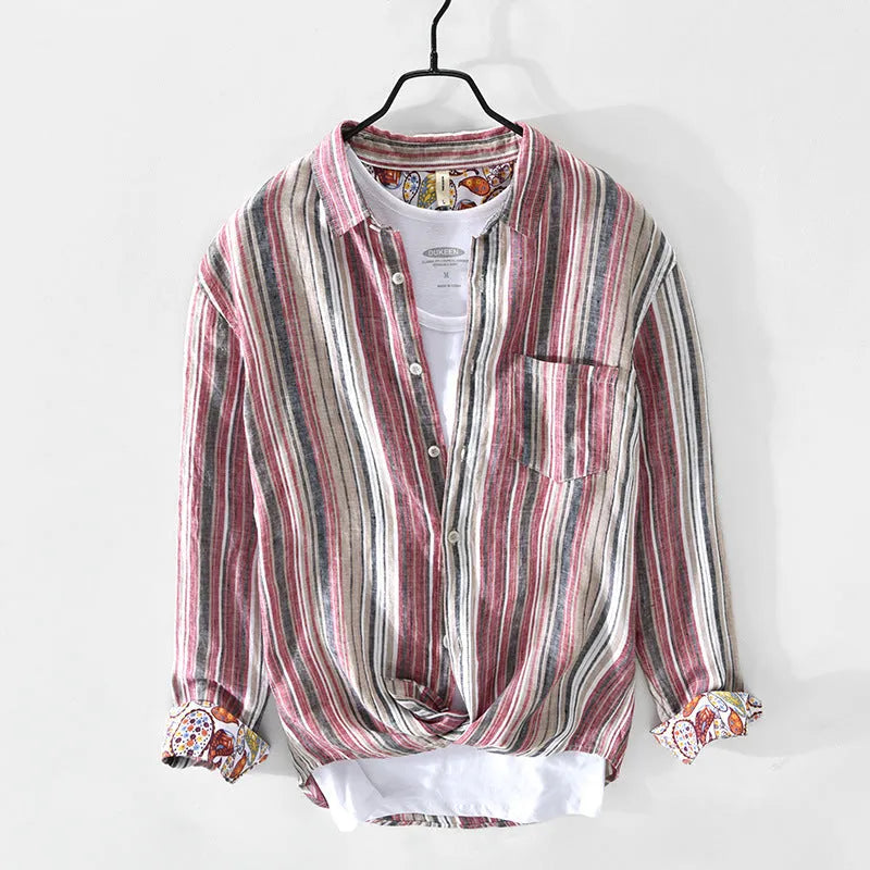 Man wearing a loose-fit red and grey striped linen long-sleeve casual shirt.