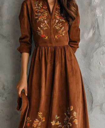 Brown vintage-style midi dress with floral embroidery and suede texture