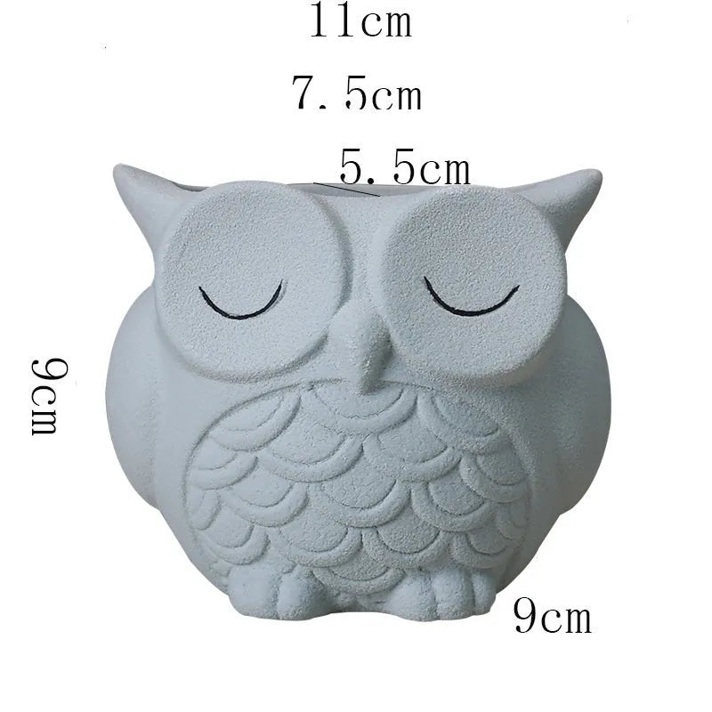 Handmade frosted ceramic flower pot with cartoon owl design for succulents.