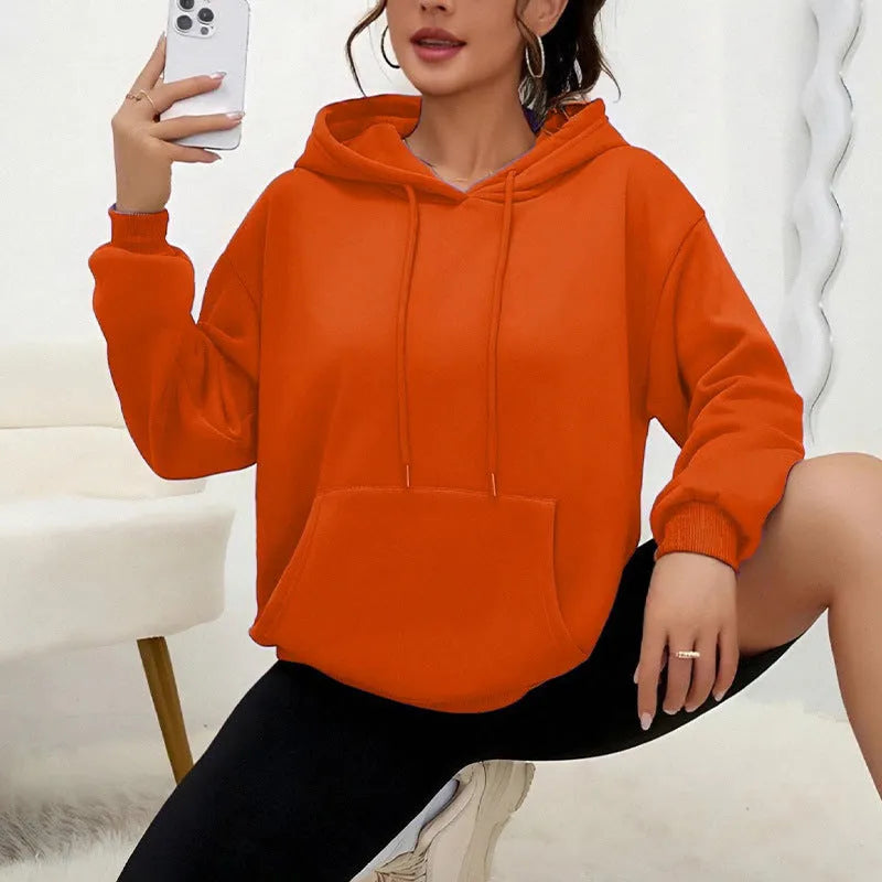 Women's loose fit long sleeve sweatshirt with drawstring and front pocket in multiple colour options