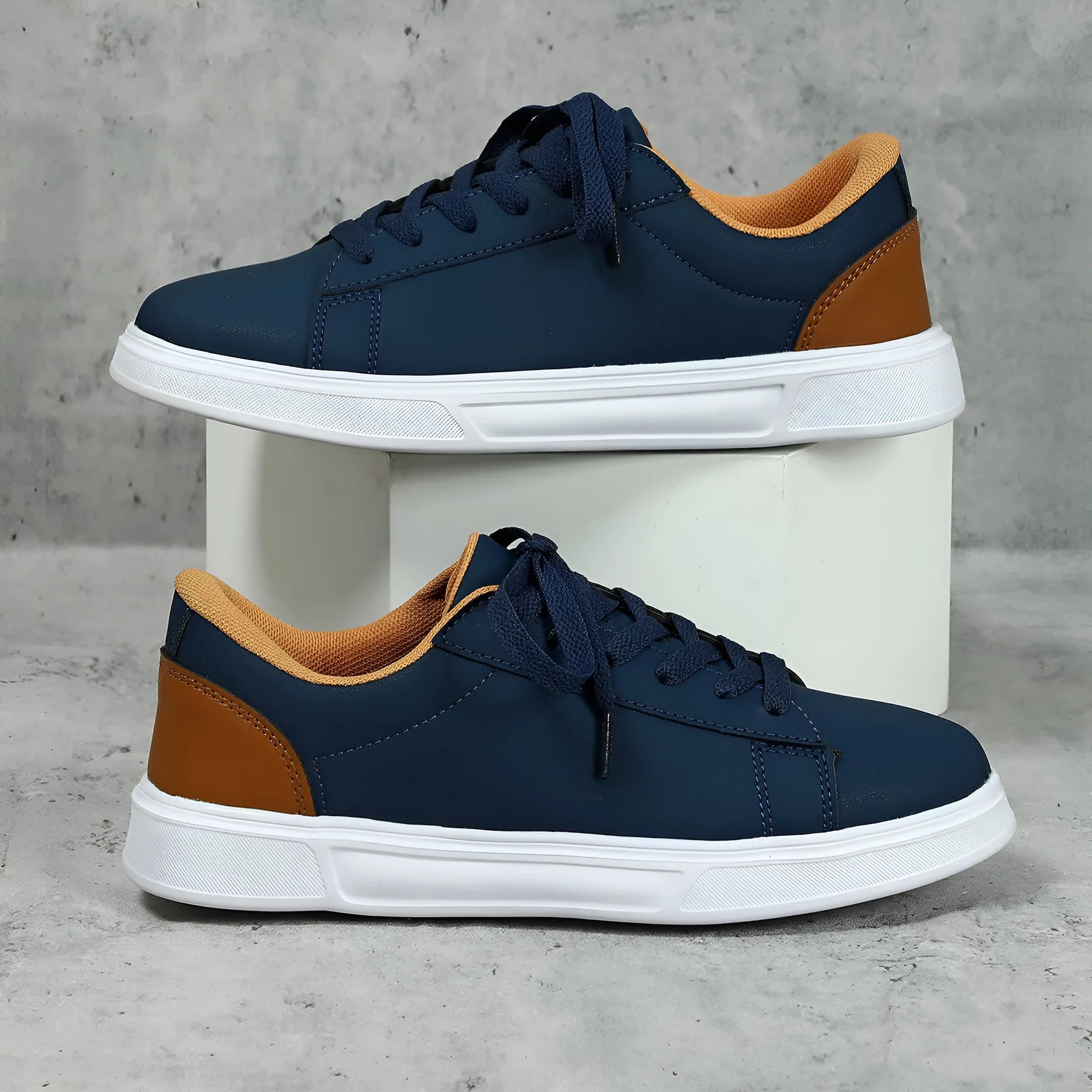 Casual platform sneaker with cross strap detail on artificial PU upper in beige brown colour