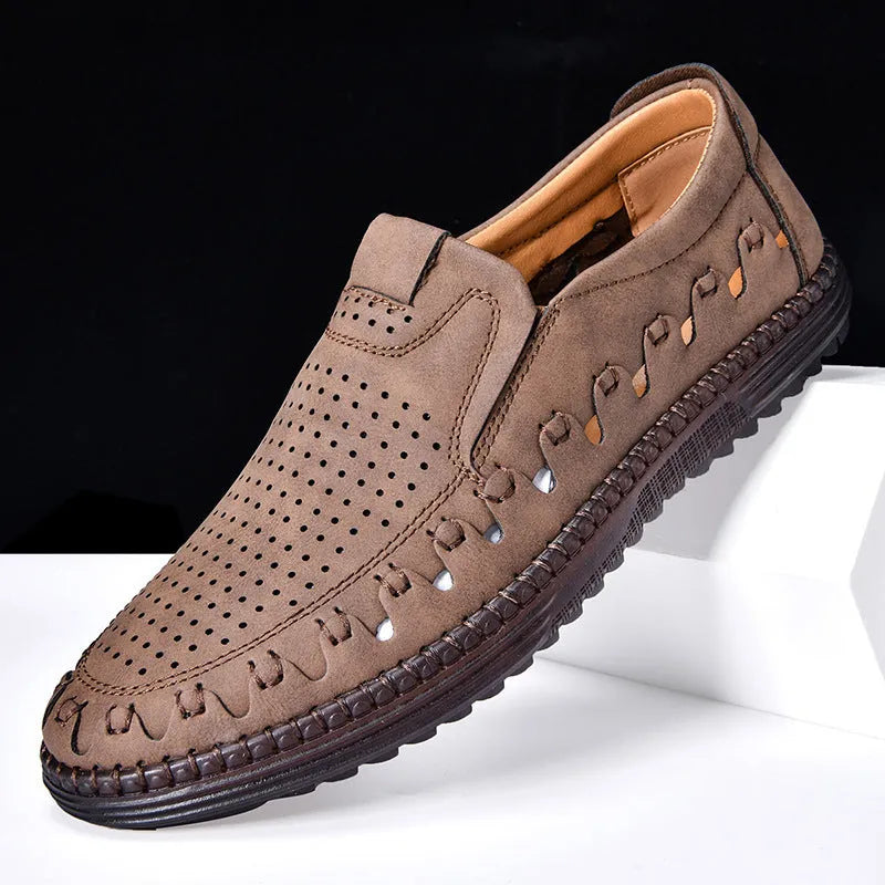 Men's brown slip-on casual shoes with round toe and flat PVC sole showing sewing line detailing