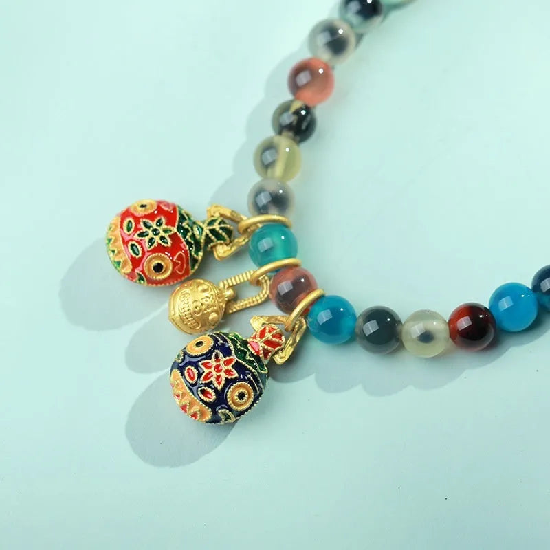 Women's natural agate bracelet with colourful sugar heart glaze and copper coin snake design in geometric style