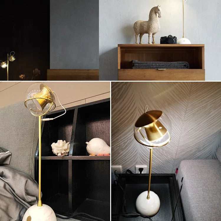 Modern glass desk lamp with a touch-sensitive dimmer base and an LED light source.