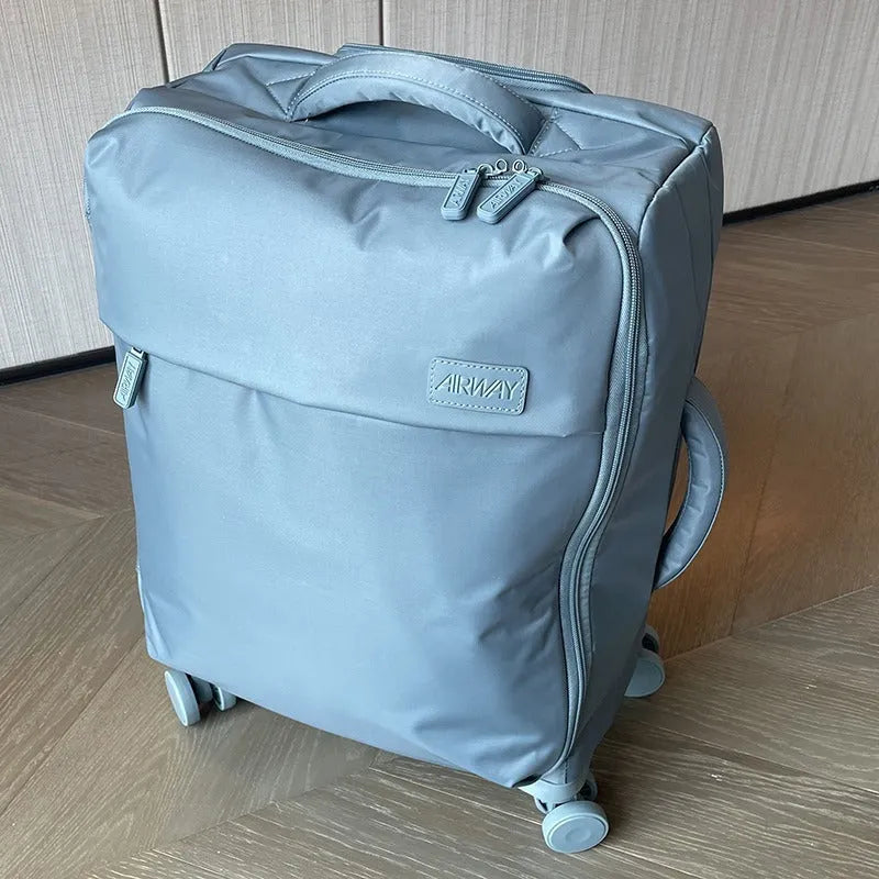 20-inch waterproof Oxford cloth suitcase in bluestone green with universal wheels