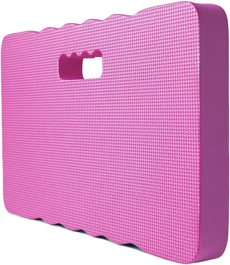 Blue Eva foam garden kneeler pad with handles and side pockets on grass.
