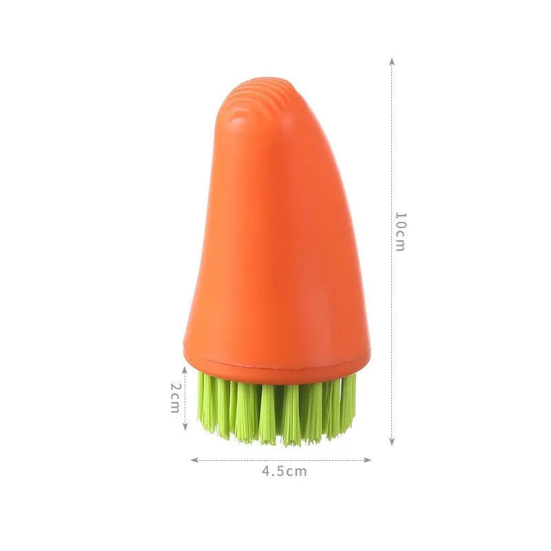 Carrot-shaped nylon kitchen cleaning brush on a white background, shown in orange and white colour options.