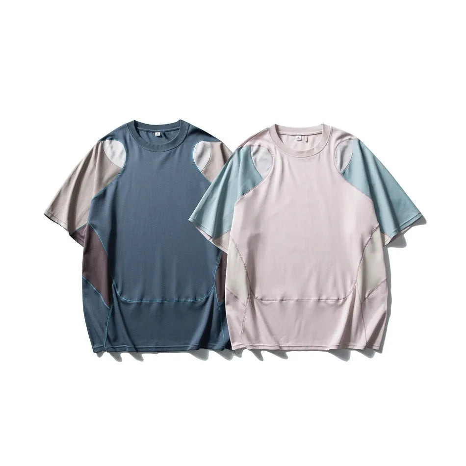 Men's loose blue sports t-shirt with patchwork contrast colour detail and raglan sleeves