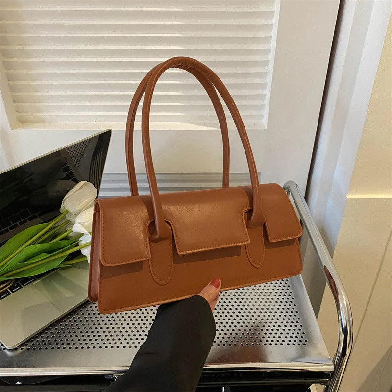 Women's small square shoulder bag in PU leather with stitching detail, shown in yellow colour