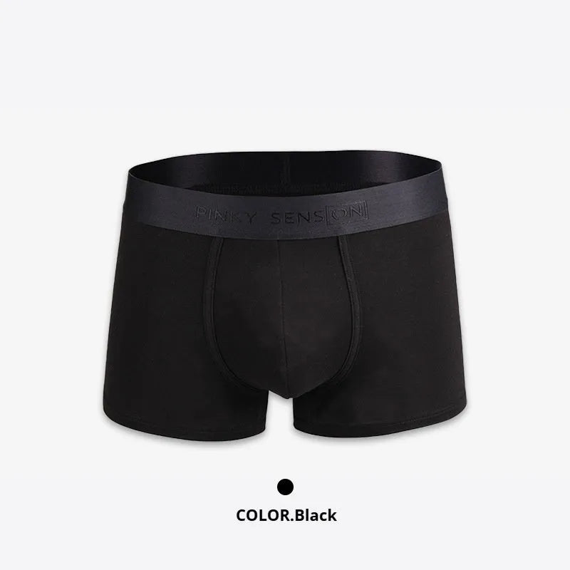 Men's solid colour cotton boxer shorts on a white background, showing available colours: black, white, silver grey, light green.