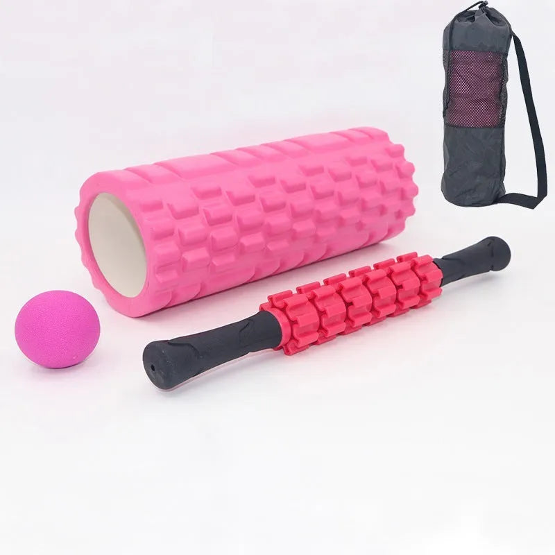 Black fitness foam roller massage bar measuring 33cm long on a plain background.
