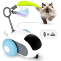 Blue smart cat toy car with feather teaser attachment and remote control on floor