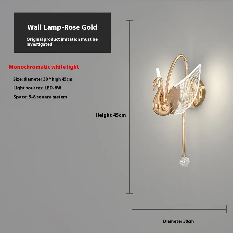 Modern gold swan-shaped wall lamp with acrylic shade and iron body for bedside lighting