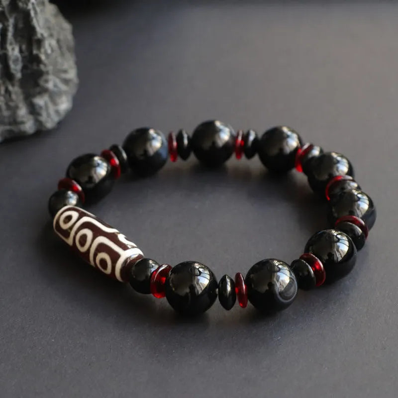 Hand-woven black agate Dzi bead bracelet with geometric design and national style elements