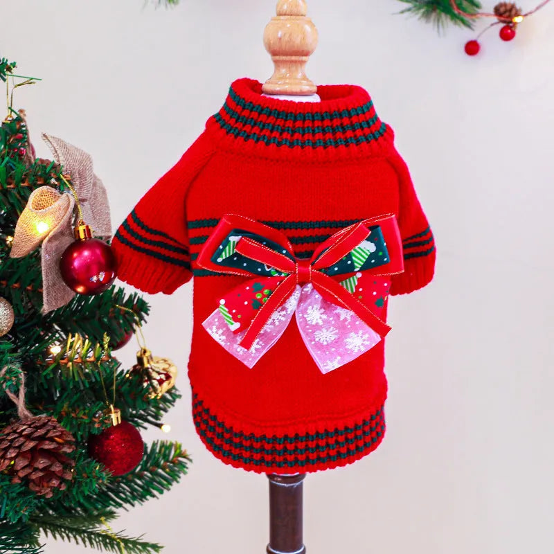 Red Christmas sweater for a dog on a festive background, showing the knit pattern and fit.
