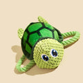 Turtle shaped dog chewing toy with internal knot in grey, green, and orange colours