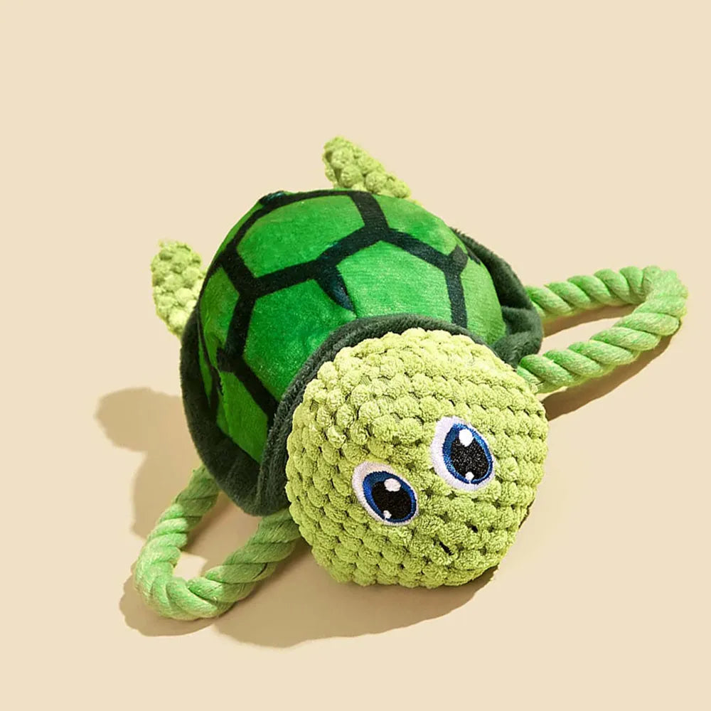 Turtle shaped dog chewing toy with internal knot in grey, green, and orange colours