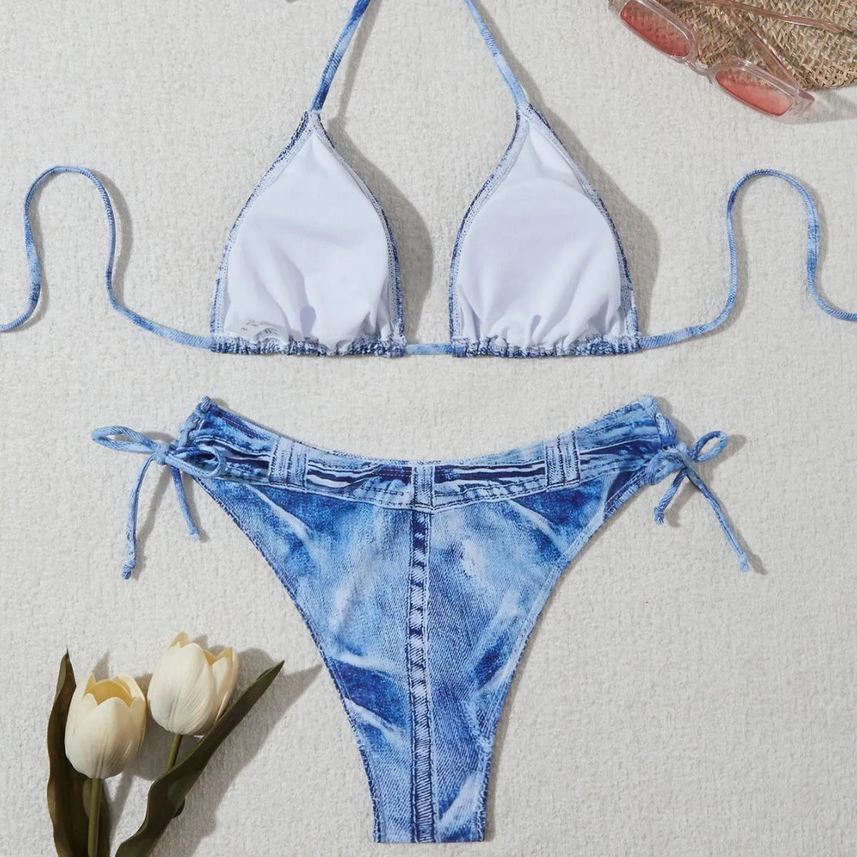 Denim blue women's bikini set with printed design and strap detail, sizes S to XL.