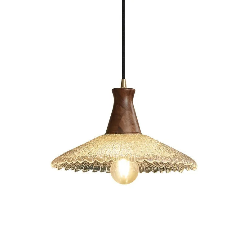 Retro wood and brass chandelier with glass shade in three size options for ceiling mounting.