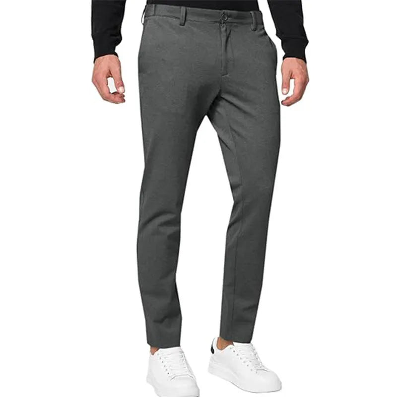 Men's slim-fit tapered chino trousers in a grey colour, showing the casual fit and style.