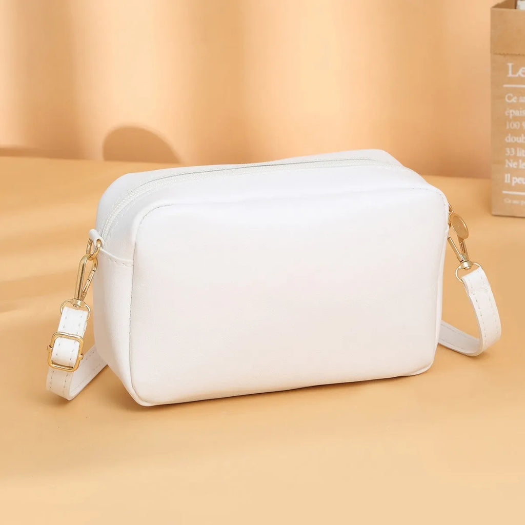 Solid colour women's PU shoulder bag with three-dimensional pockets in horizontal square shape