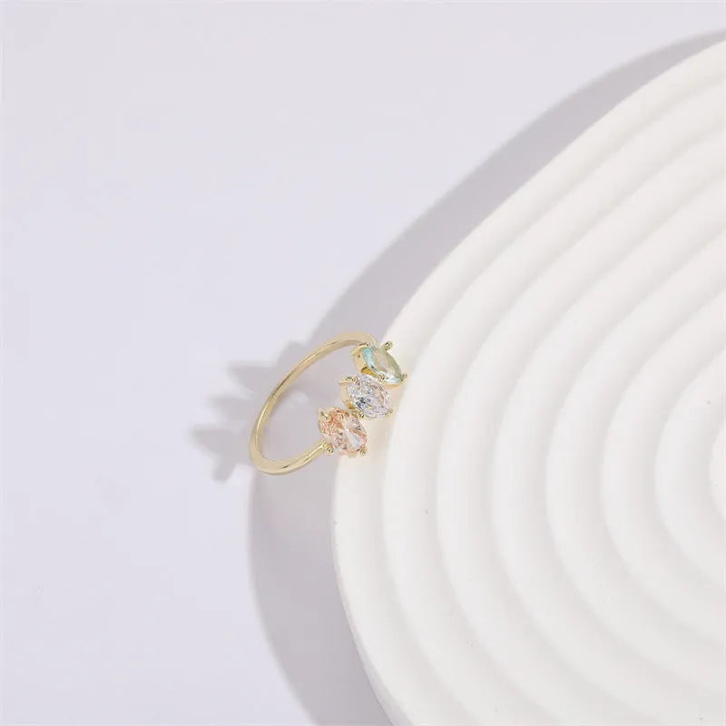 Geometric triangle women's ring with horse eye tricolour zircon stone in electroplated 14k gold colour