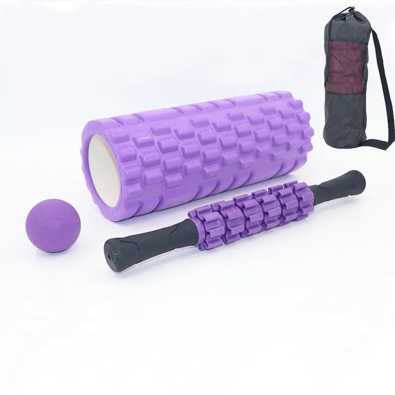 Black fitness foam roller massage bar measuring 33cm long on a plain background.
