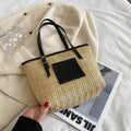 Women's straw woven shoulder bag in European retro style with three-dimensional pocket and sewing thread detail