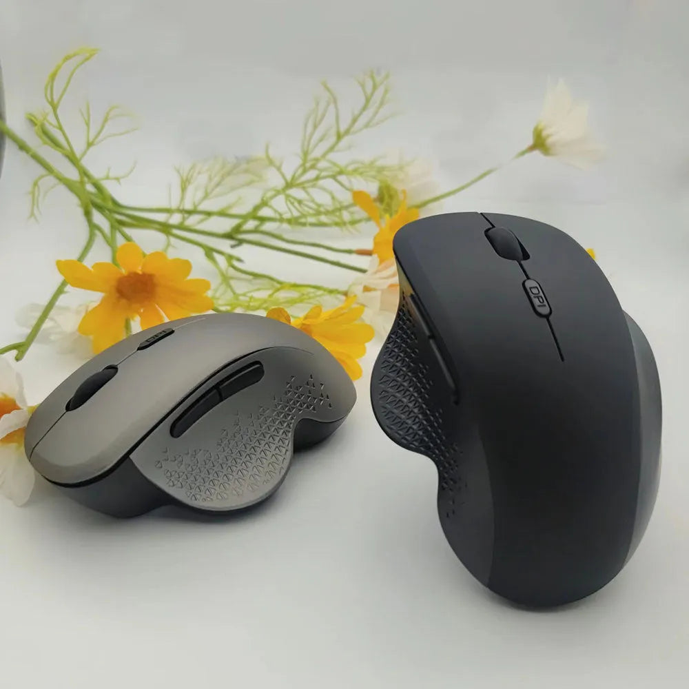Grey and black self-charging wireless optical mouse for laptops with USB charging cable