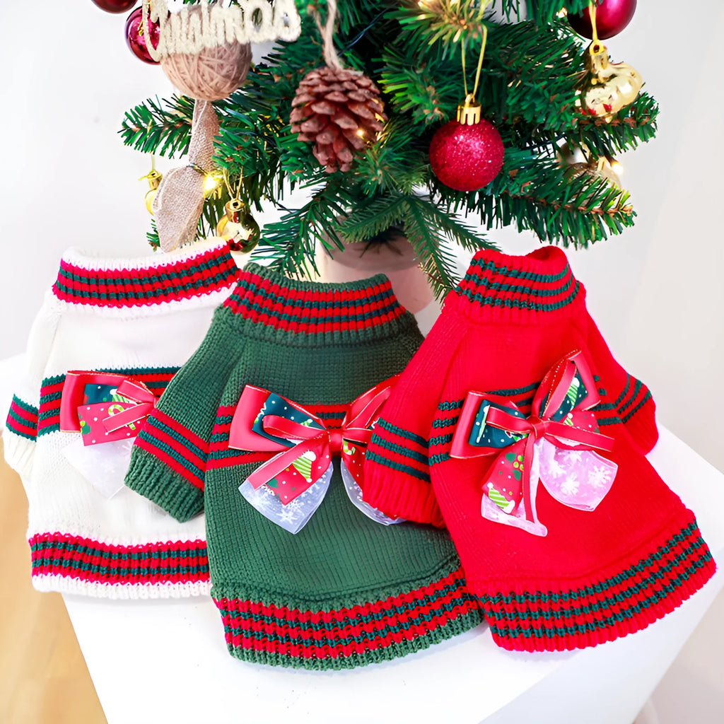Red Christmas sweater for a dog on a festive background, showing the knit pattern and fit.