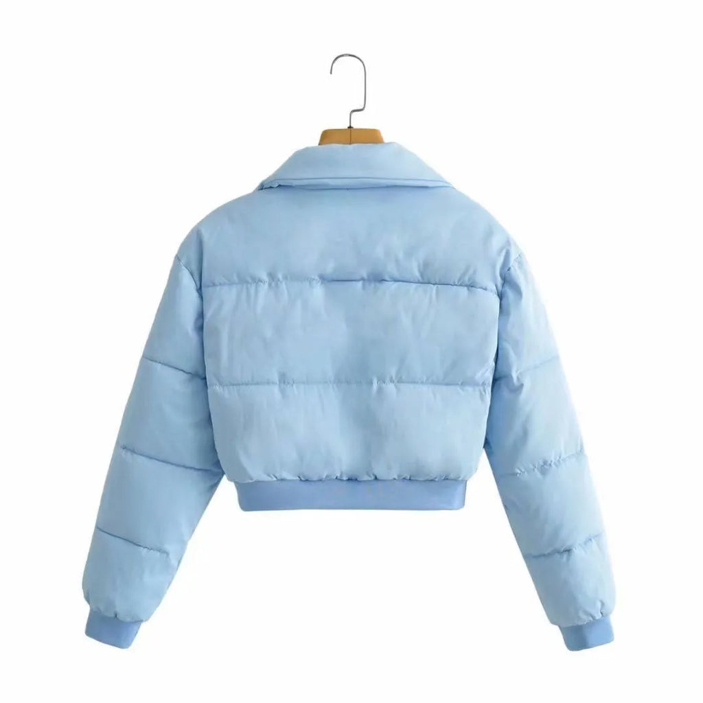 Women's loose fit polyester jacket in blue with long sleeves