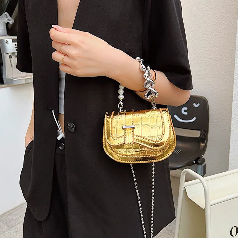 Women's silver PU mini tote saddle crossbody bag with single strap and phone compartment