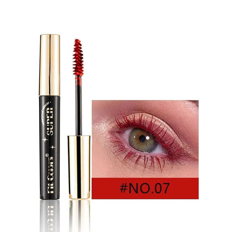 Colourful waterproof mascara tube displaying vibrant shades like wine red, gold, and mermaid green for stage and event makeup.
