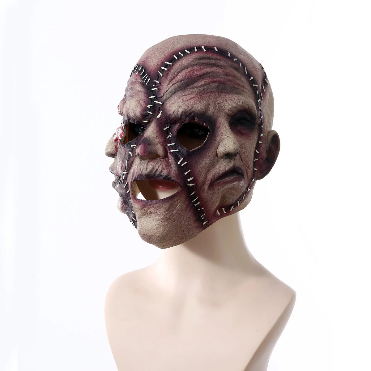 Three-sided grimace horror mask showing realistic facial texture made from natural latex