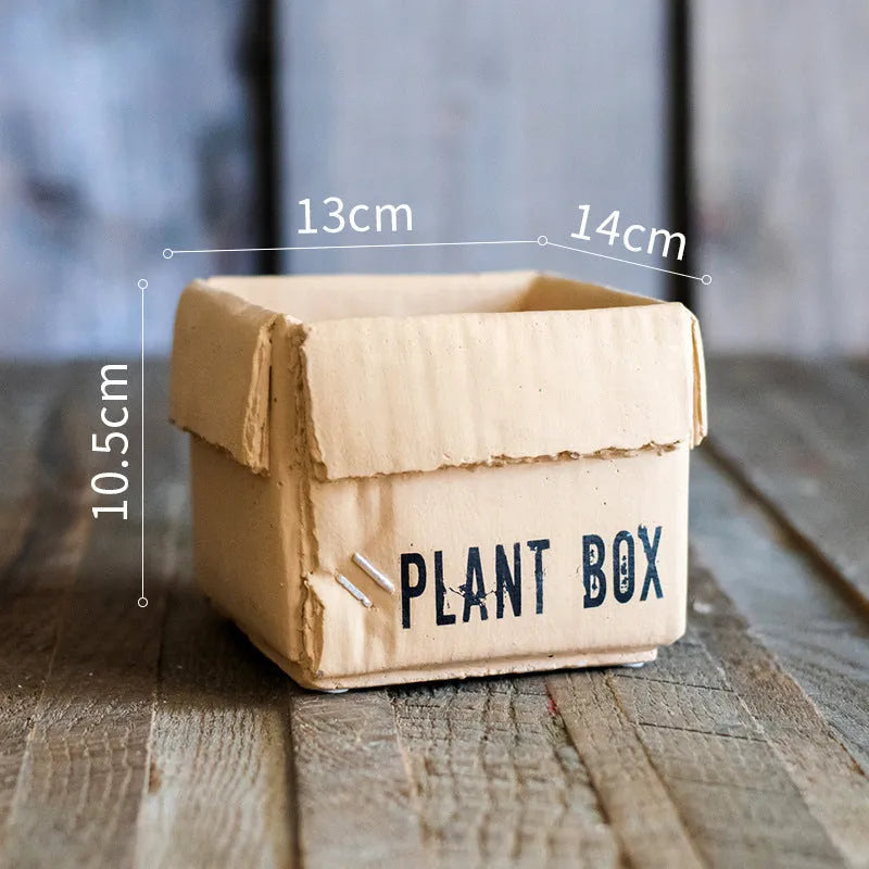 Nordic-style cement brown paper box flowerpot for indoor planting on a floor.