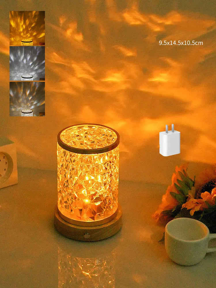 Small acrylic night light with water ripple effect on a solid wood base, showing touch control and USB port.