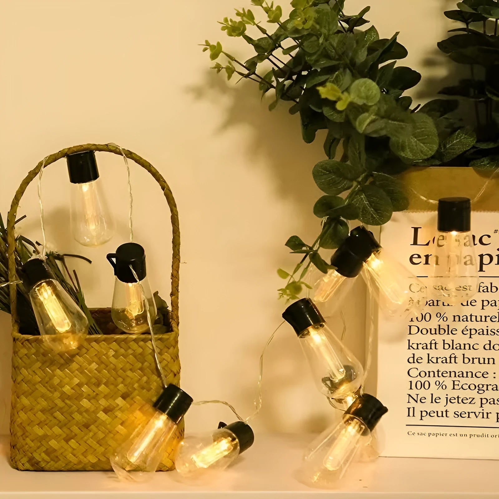 Solar retro outdoor string lights with long bulb infusion bottle shape and IP55 waterproof rating
