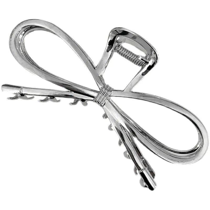 Korean style alloy bow barrette hair clip in gold or silver colour for women