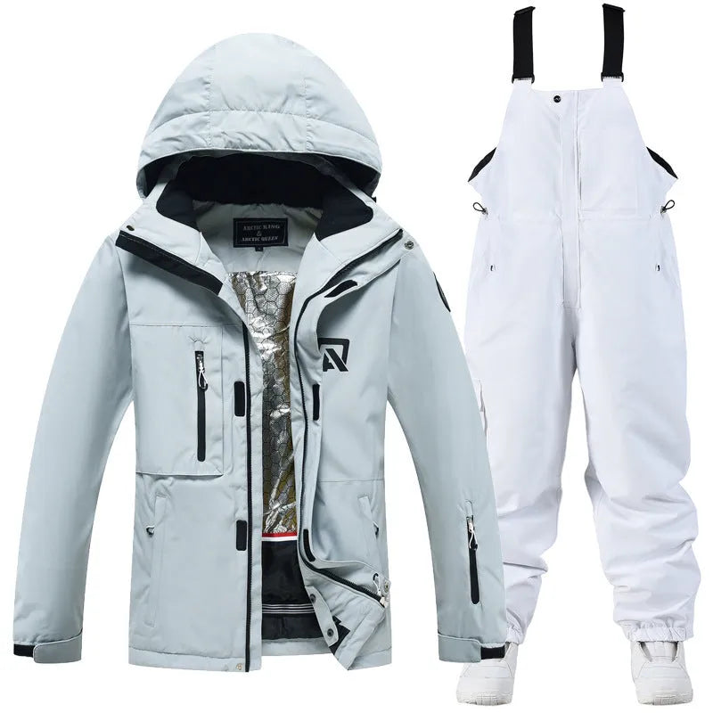Blue and black unisex winter ski suit jacket and pants for snow sports.
