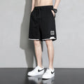 Cotton shorts for boys in plus sizes, shown in black, khaki, and white colour options.