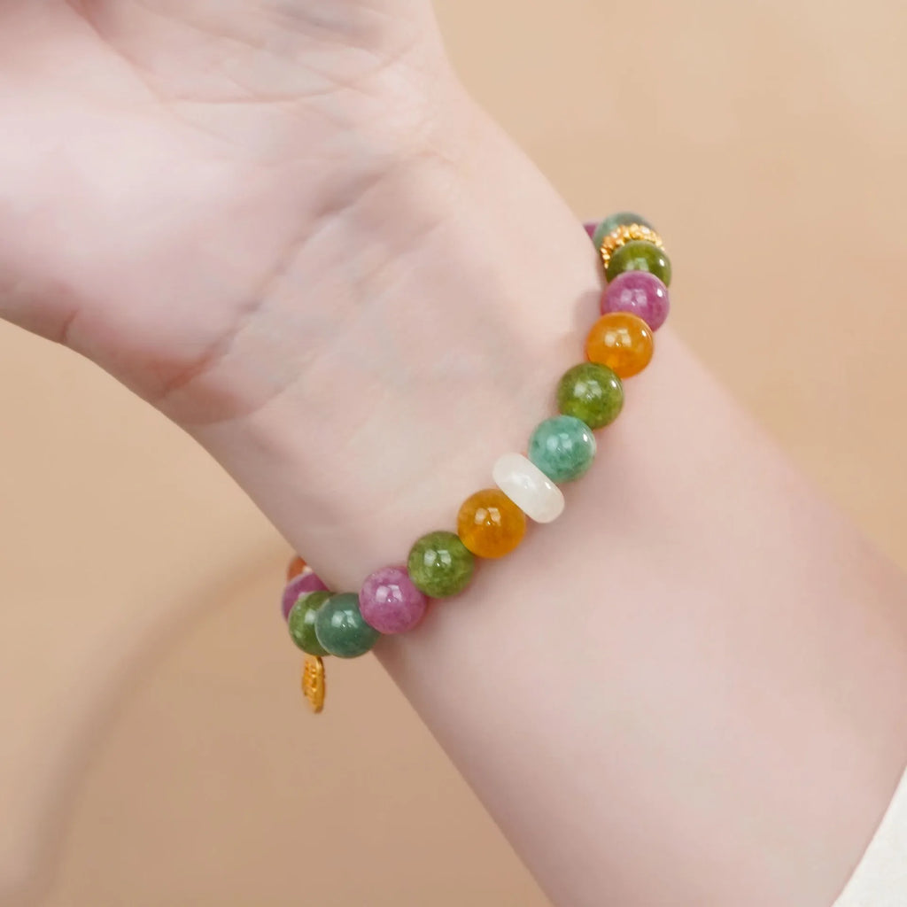Natural rainbow tourmaline jade half-bracelet for women showing colourful stone construction