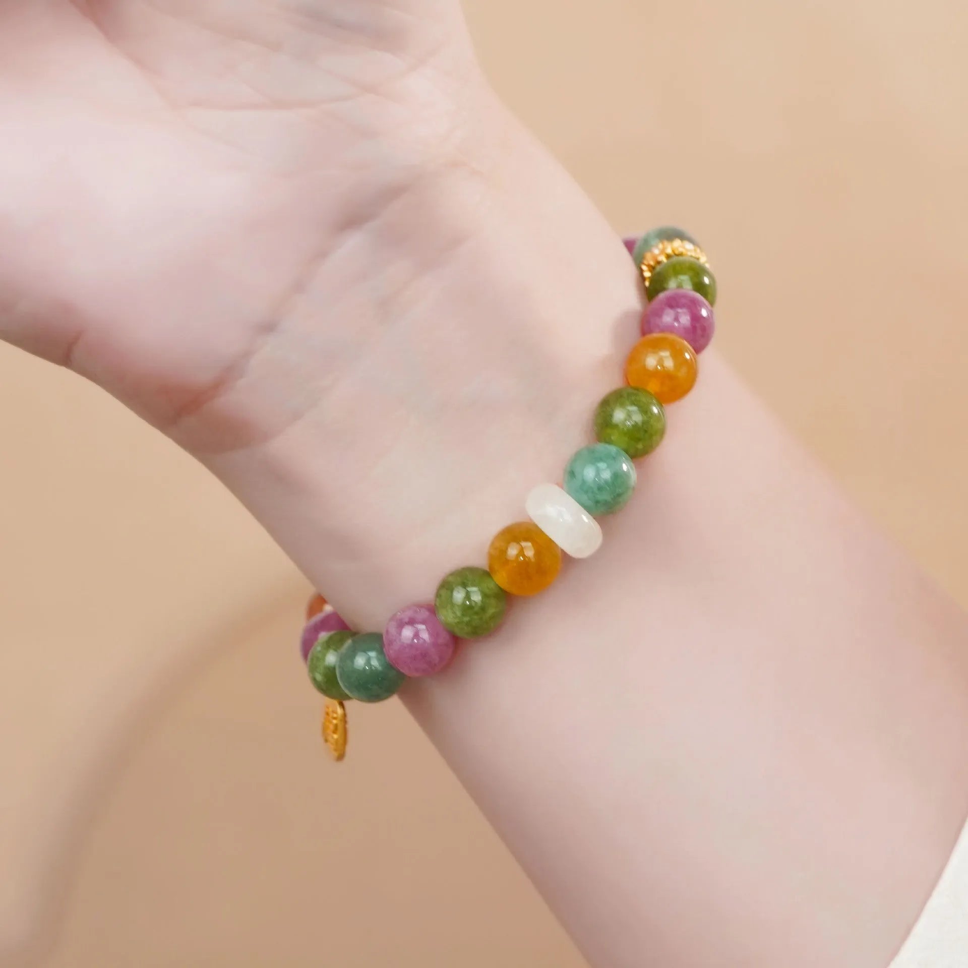 Natural rainbow tourmaline jade half-bracelet for women showing colourful stone construction