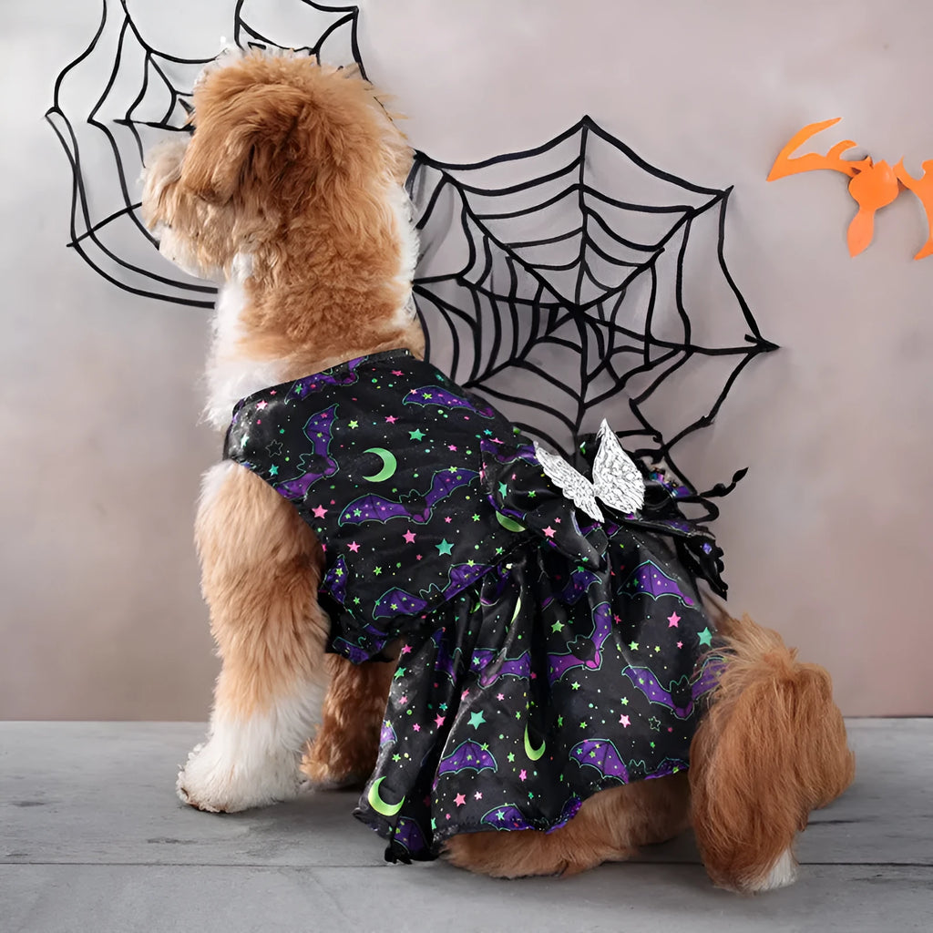 Orange angel wings Halloween costume for a dog on a mannequin.