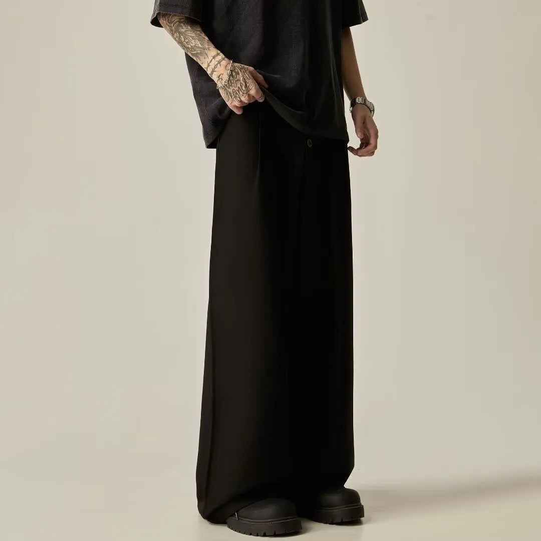 Men's solid colour polyester casual trousers with wide-leg design and elastic mid waist
