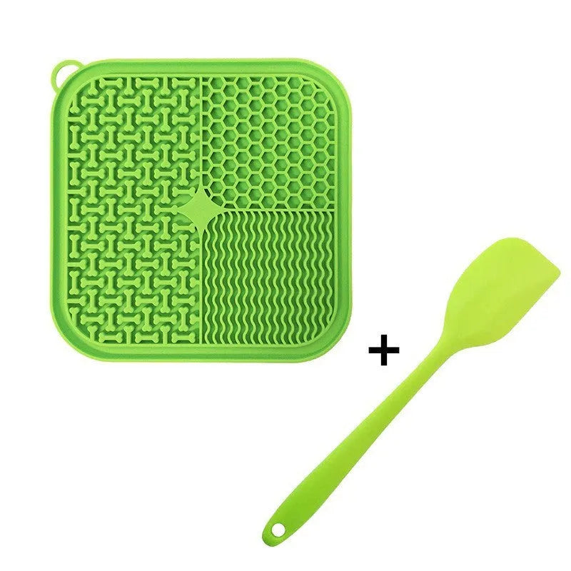 Blue silicone dog licking mat with textured surface and suction cups on back for slow feeding and anxiety relief