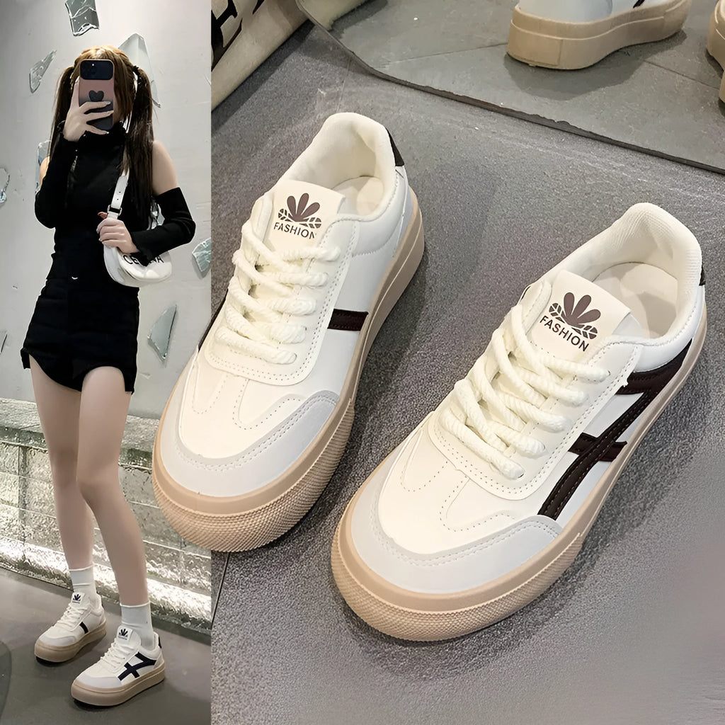 Low-top lace-up board shoes in brown or blue with patent leather-look finish and round toe