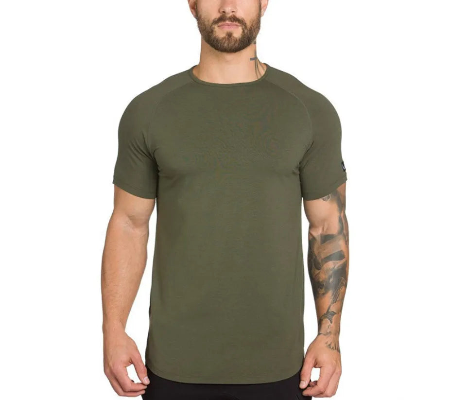 Plain men's gym shirt in cotton-spandex blend on a hanger, shown in army green colour.
