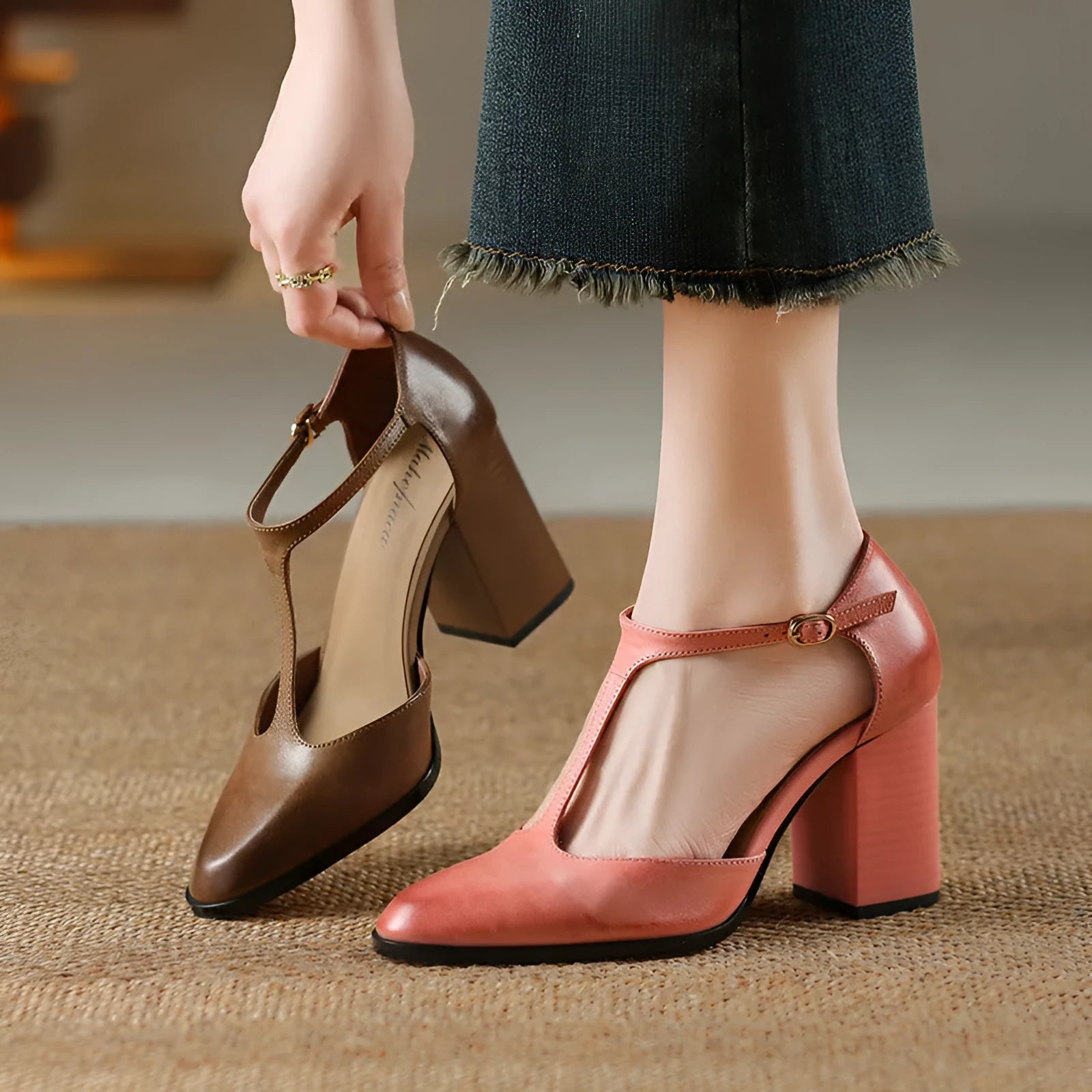 Baotou hollow-cut retro Mary Jane shoes in dark brown with pointed toe and buckle fastening.